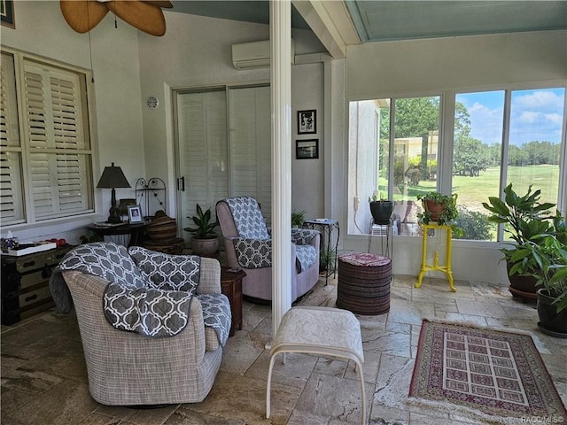 4755 N El Camino Dr, Beverly Hills, FL 34465 - sunroom / solarium featuring stone tile floors, plenty of natural light, and a wall mounted AC