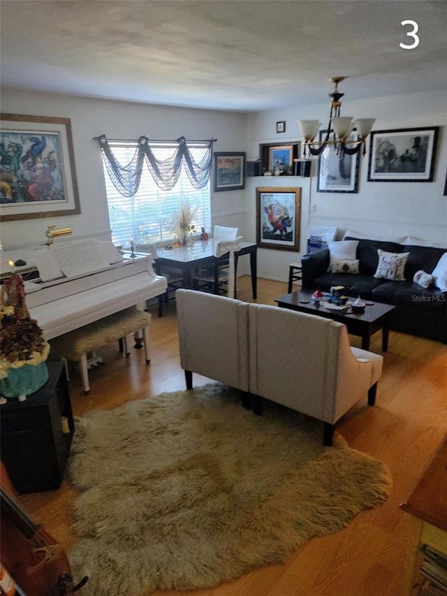 1683 Pine St, Largo, FL 33774 - living room with a chandelier and wood finished floors