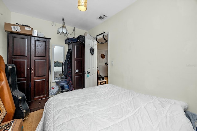 1683 Pine St, Largo, FL 33774 - bedroom with light wood-style floors
