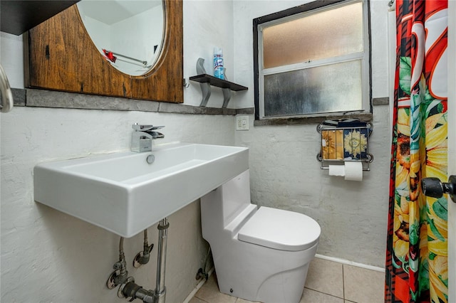 1683 Pine St, Largo, FL 33774 - full bath featuring toilet and tile patterned flooring