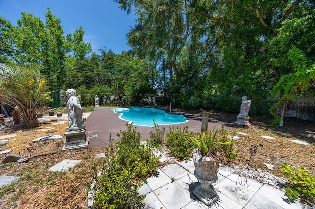 1683 Pine St, Largo, FL 33774 - view of swimming pool featuring a fenced backyard and a patio