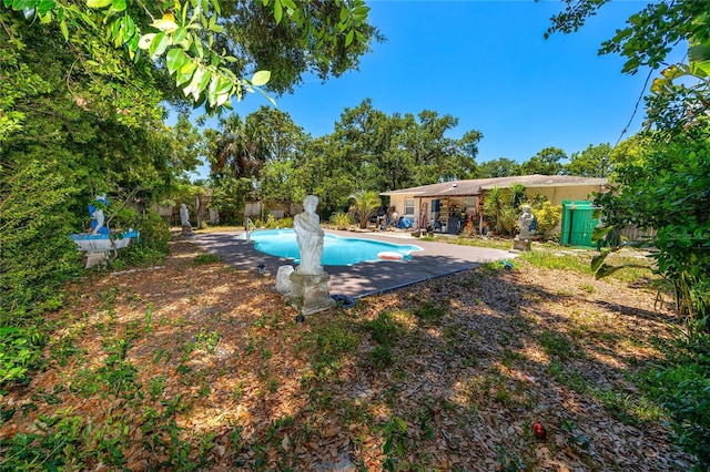 1683 Pine St, Largo, FL 33774 - view of swimming pool featuring a patio and a fenced backyard