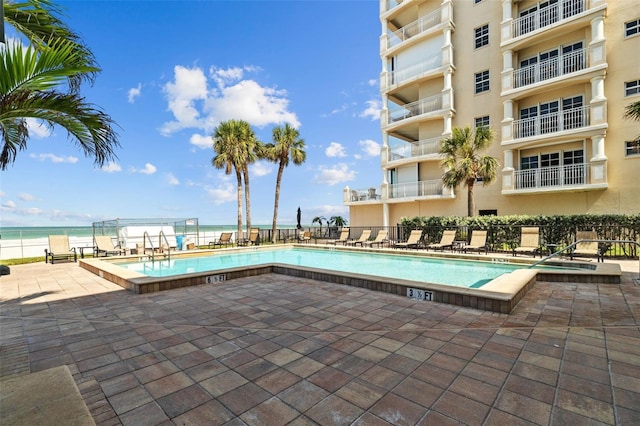 17710 Gulf Blvd Unit 304, Redington Shores, FL 33708 - community pool featuring a patio area