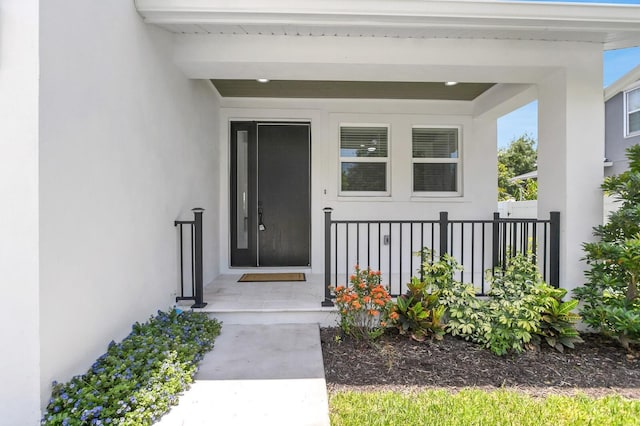 3616 W Anderson Ave, Tampa, FL 33611 - view of exterior entry featuring stucco siding