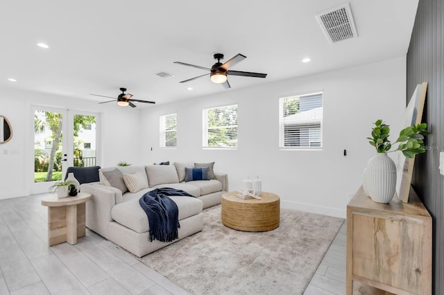 3616 W Anderson Ave, Tampa, FL 33611 - living area with a ceiling fan, recessed lighting, and french doors