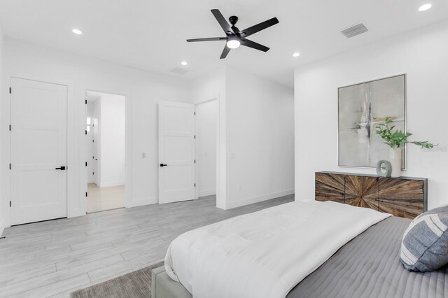 3616 W Anderson Ave, Tampa, FL 33611 - bedroom with recessed lighting, light wood-style floors, baseboards, and ceiling fan
