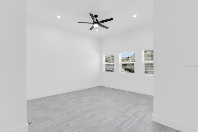 3616 W Anderson Ave, Tampa, FL 33611 - empty room with recessed lighting, light wood-style flooring, a ceiling fan, and baseboards