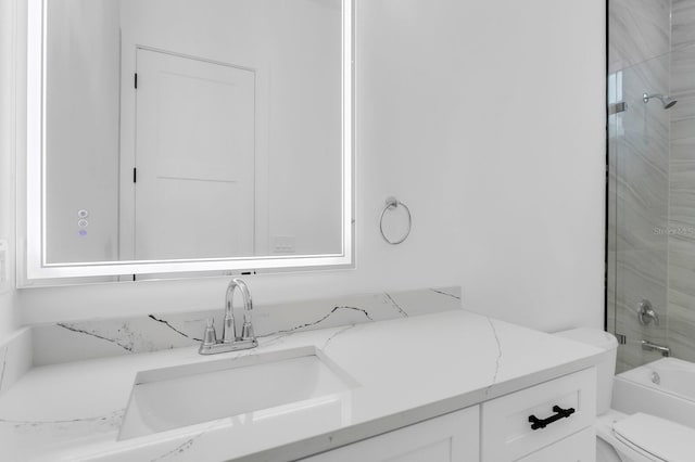 3616 W Anderson Ave, Tampa, FL 33611 - bathroom featuring toilet, vanity, and bathing tub / shower combination