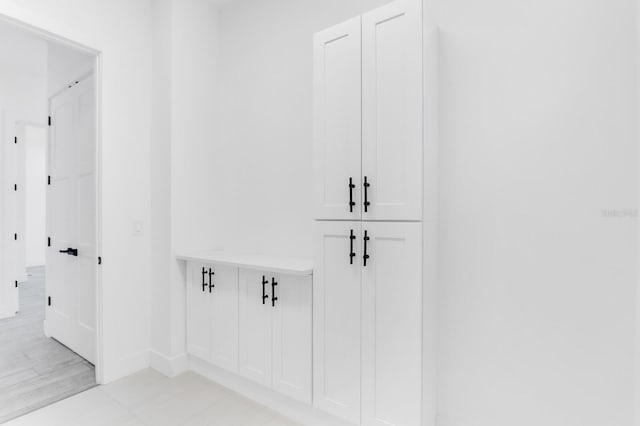 3616 W Anderson Ave, Tampa, FL 33611 - mudroom featuring baseboards