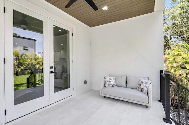 3616 W Anderson Ave, Tampa, FL 33611 - balcony with french doors and ceiling fan