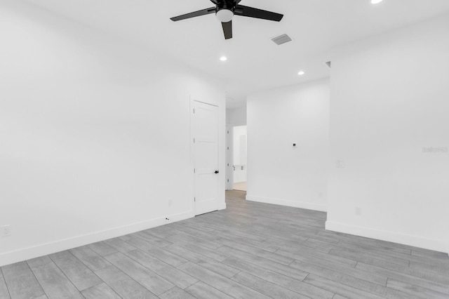 3616 W Anderson Ave, Tampa, FL 33611 - spare room featuring ceiling fan, recessed lighting, light wood-type flooring, and baseboards
