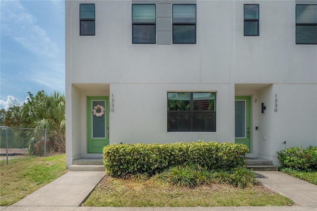 1330 W Gray St Unit 1, Tampa, FL 33606 - view of property with stucco siding