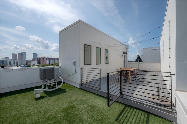 1330 W Gray St Unit 1, Tampa, FL 33606 - view of home's exterior with a balcony and cooling unit
