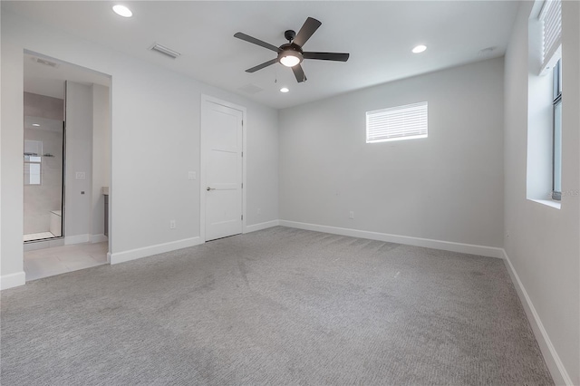 1330 W Gray St Unit 1, Tampa, FL 33606 - empty room featuring light carpet, a ceiling fan, recessed lighting, and baseboards