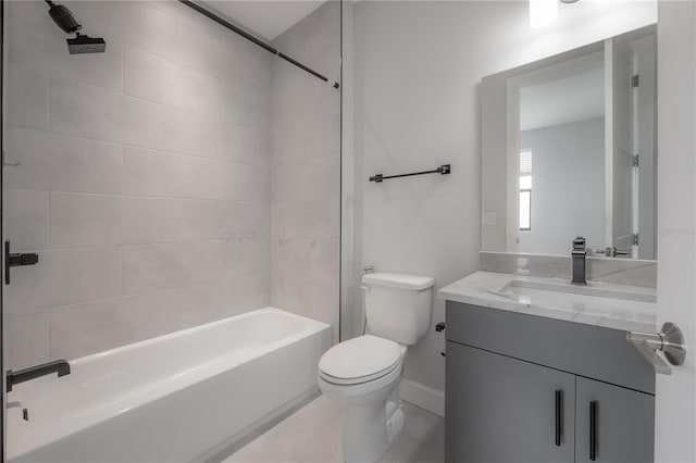 1330 W Gray St Unit 1, Tampa, FL 33606 - full bath featuring toilet, vanity, shower / bathtub combination, baseboards, and tile patterned floors