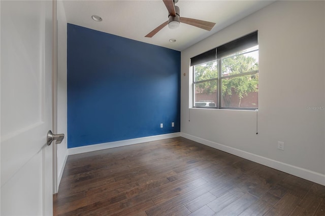 1330 W Gray St Unit 1, Tampa, FL 33606 - spare room with a ceiling fan, wood finished floors, and baseboards