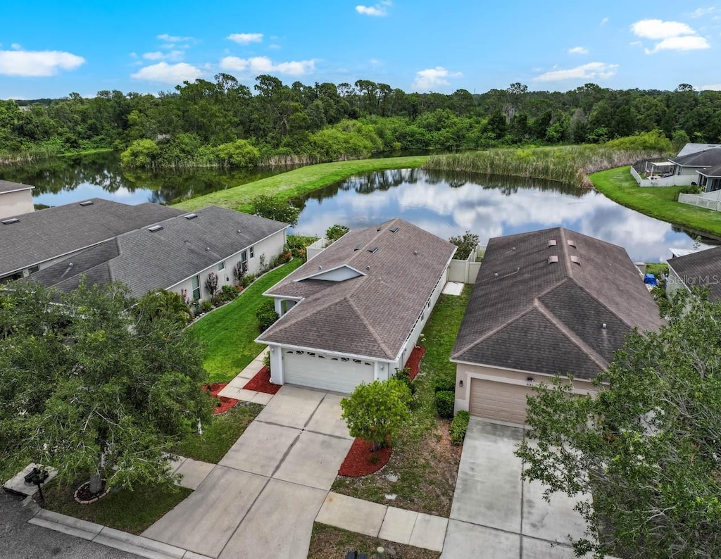 816 College Chase Dr, Ruskin, FL 33570 - aerial view of property and surrounding area featuring a nearby body of water and a heavily wooded area