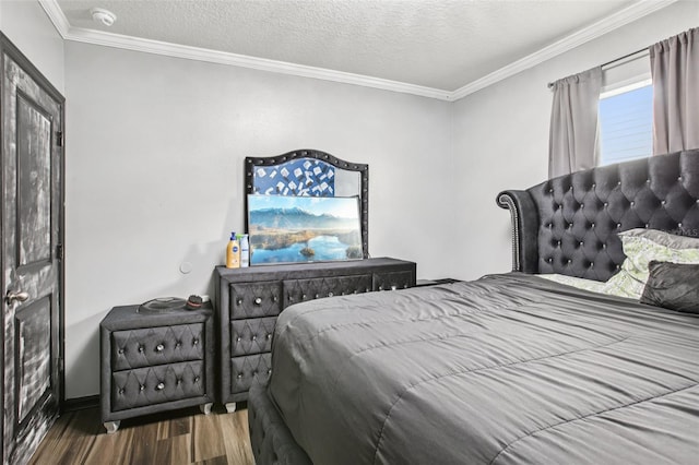 10233 Opaline Sky Pl, Riverview, FL 33578 - bedroom featuring wood finished floors, crown molding, baseboards, and a textured ceiling