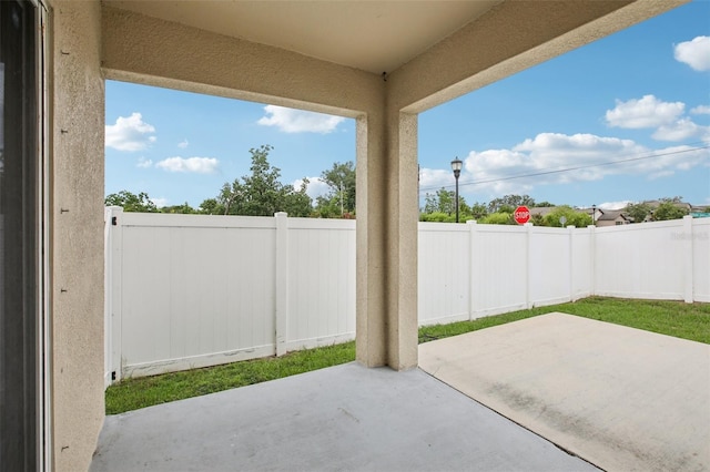 10233 Opaline Sky Pl, Riverview, FL 33578 - fenced backyard with a patio area