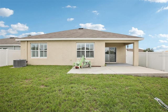 10233 Opaline Sky Pl, Riverview, FL 33578 - back of property featuring central air condition unit, a patio area, and stucco siding