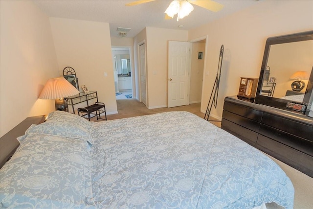 2826 Martha Ln, Land O Lakes, FL 34639 - bedroom featuring carpet floors, baseboards, a ceiling fan, ensuite bath, and a closet