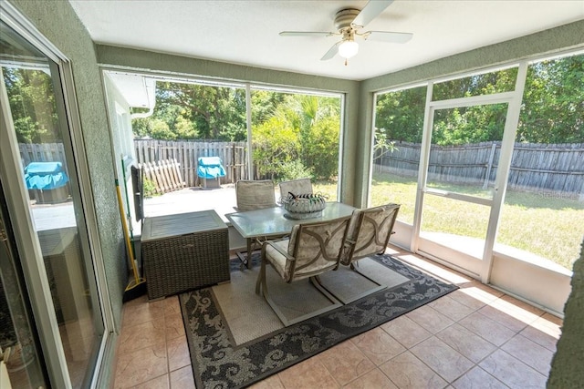 2826 Martha Ln, Land O Lakes, FL 34639 - sunroom with a ceiling fan and outdoor dining area