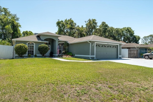 2826 Martha Ln, Land O Lakes, FL 34639 - ranch-style house with an attached garage, concrete driveway, and stucco siding