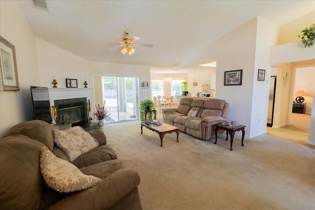 2826 Martha Ln, Land O Lakes, FL 34639 - living room featuring light colored carpet, a ceiling fan, a fireplace, baseboards, and vaulted ceiling