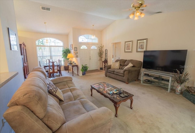 2826 Martha Ln, Land O Lakes, FL 34639 - living area featuring carpet, lofted ceiling, and a ceiling fan