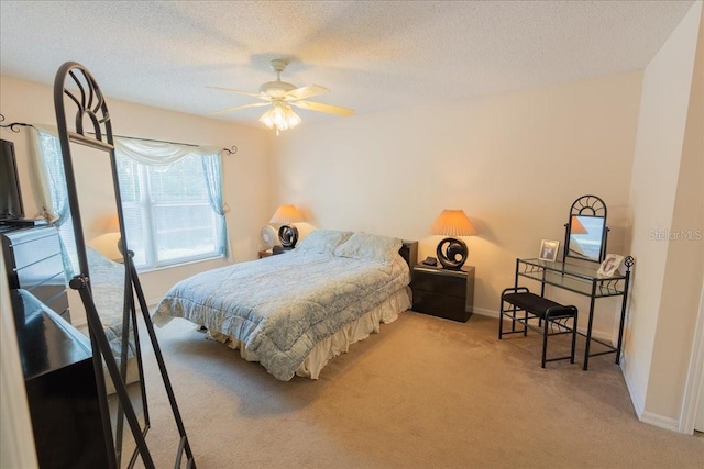2826 Martha Ln, Land O Lakes, FL 34639 - bedroom with carpet flooring, a textured ceiling, baseboards, and a ceiling fan