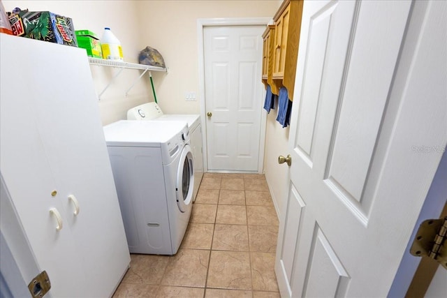 2826 Martha Ln, Land O Lakes, FL 34639 - laundry room with washing machine and clothes dryer and light tile patterned floors