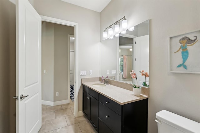 14715 Fishhawk Preserve Dr, Lithia, FL 33547 - full bath with vanity, toilet, tile patterned floors, and baseboards