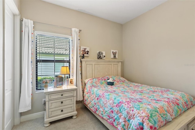 14715 Fishhawk Preserve Dr, Lithia, FL 33547 - bedroom featuring light carpet and baseboards