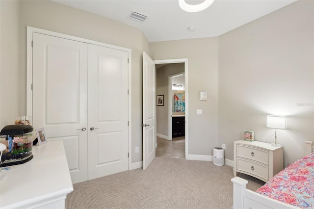 14715 Fishhawk Preserve Dr, Lithia, FL 33547 - bedroom featuring light carpet, baseboards, and a closet