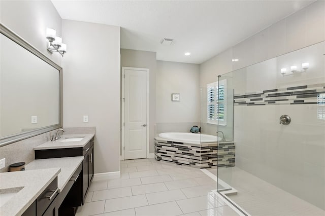 14715 Fishhawk Preserve Dr, Lithia, FL 33547 - full bathroom featuring vanity, tiled shower, a bath, tile patterned floors, and baseboards