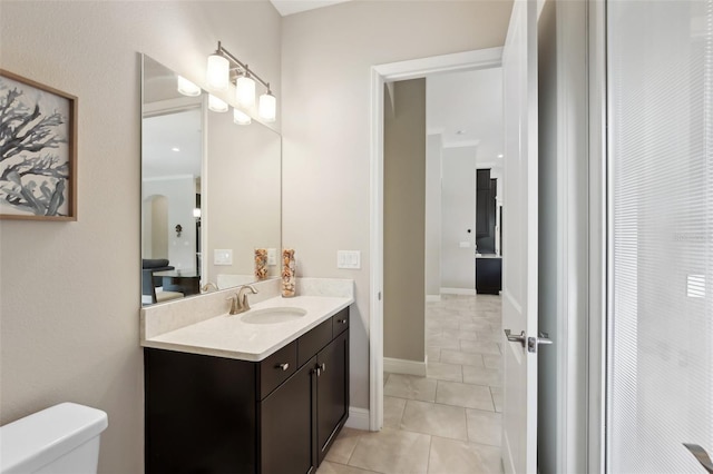 14715 Fishhawk Preserve Dr, Lithia, FL 33547 - bathroom with vanity, toilet, tile patterned flooring, and baseboards
