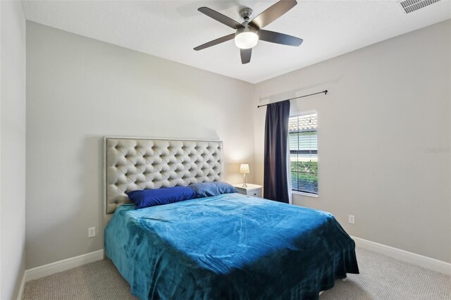 14715 Fishhawk Preserve Dr, Lithia, FL 33547 - carpeted bedroom with baseboards and a ceiling fan