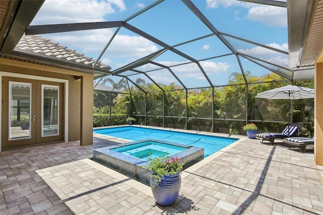 14715 Fishhawk Preserve Dr, Lithia, FL 33547 - view of pool featuring french doors, a patio, and a pool with connected hot tub