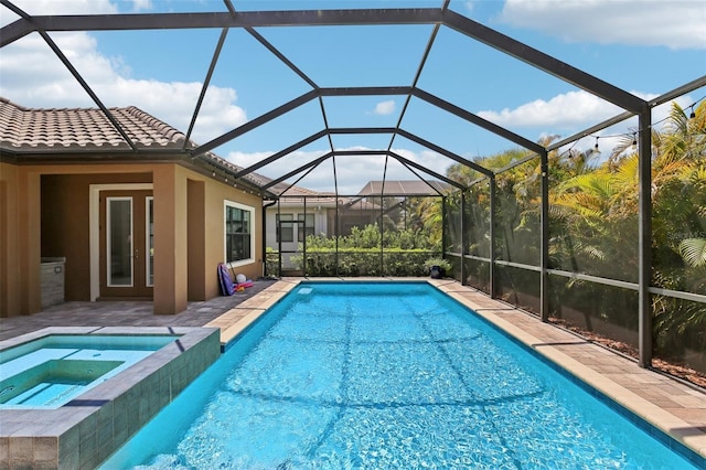 14715 Fishhawk Preserve Dr, Lithia, FL 33547 - view of swimming pool with a pool with connected hot tub and a patio area