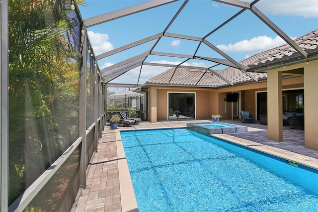 14715 Fishhawk Preserve Dr, Lithia, FL 33547 - view of pool featuring a patio, glass enclosure, and a pool with connected hot tub