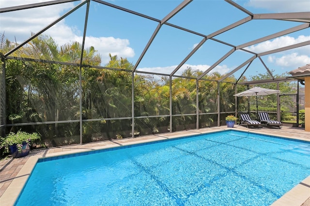 14715 Fishhawk Preserve Dr, Lithia, FL 33547 - outdoor pool featuring glass enclosure and a patio area