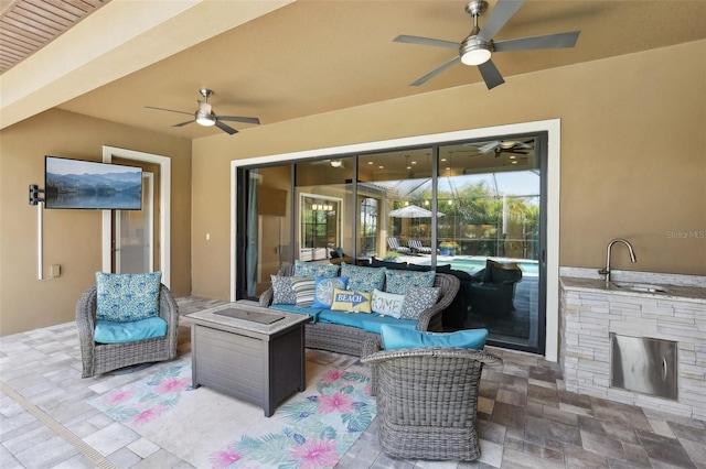 14715 Fishhawk Preserve Dr, Lithia, FL 33547 - view of patio / terrace with a ceiling fan, an outdoor hangout area, and a sink