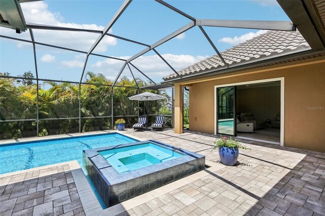 14715 Fishhawk Preserve Dr, Lithia, FL 33547 - view of pool with a patio area, a lanai, and a pool with connected hot tub