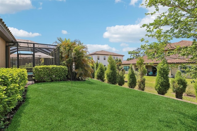 14715 Fishhawk Preserve Dr, Lithia, FL 33547 - view of green lawn with glass enclosure
