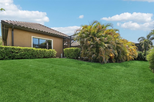 14715 Fishhawk Preserve Dr, Lithia, FL 33547 - view of green lawn featuring glass enclosure