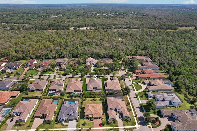 14715 Fishhawk Preserve Dr, Lithia, FL 33547 - aerial view of property and surrounding area featuring a heavily wooded area and nearby suburban area
