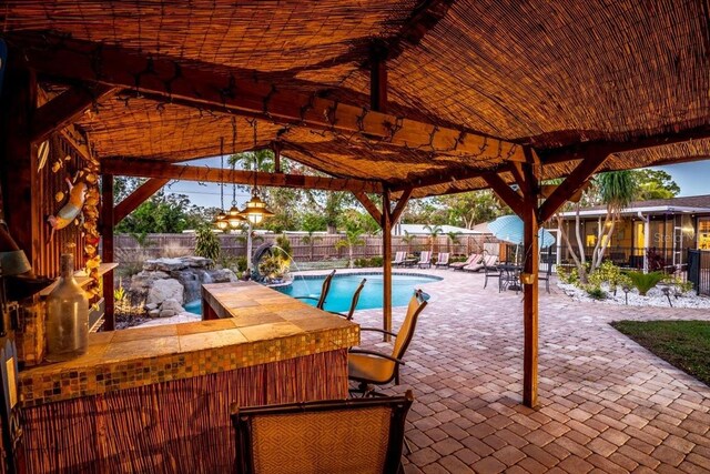 4301 S Lockwood Ridge Rd, Sarasota, FL 34231 - fenced backyard with a gazebo and a patio area