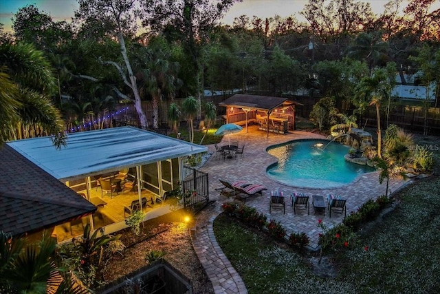 4301 S Lockwood Ridge Rd, Sarasota, FL 34231 - view of pool featuring a fenced backyard, a patio, outdoor dining area, and an outdoor structure