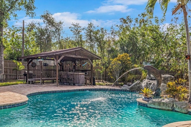 4301 S Lockwood Ridge Rd, Sarasota, FL 34231 - view of swimming pool with a fenced backyard, a gazebo, and a patio