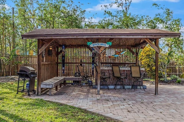 4301 S Lockwood Ridge Rd, Sarasota, FL 34231 - view of patio with a grill and a gazebo